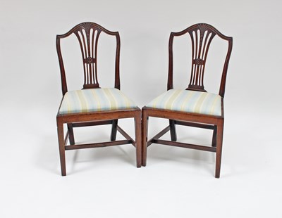 Lot 96 - A pair of mahogany pierced splat-back single...