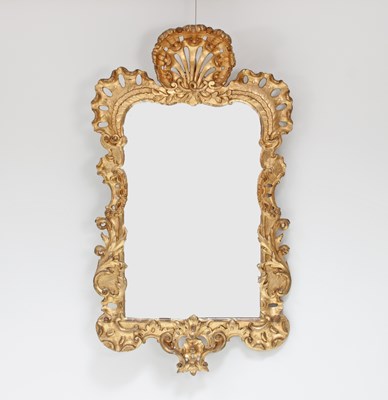 Lot 97 - A George II giltwood mirror, the frame with...