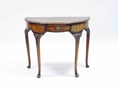 Lot 108 - A walnut half-round table of Queen Anne design,...