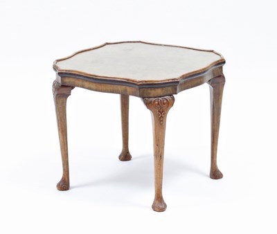 Lot 119 - A square figured walnut coffee table raised on...