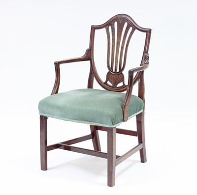 Lot 125 - A shield back armchair with upholstered seat,...