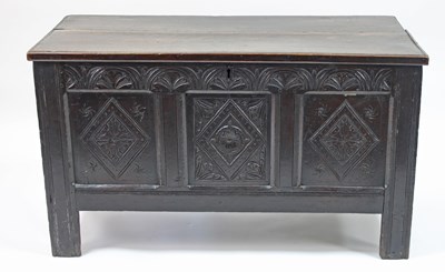 Lot 134 - A 19th Century oak chest with hinged cover on...