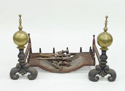 Lot 137 - A pair of brass and iron andirons and a fire...