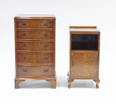 Lot 154 - A figured walnut serpentine front chest fitted...