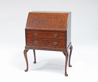 Lot 189 - A Queen Anne style walnut bureau on cabriole...