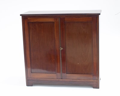 Lot 204 - A mahogany side cabinet enclosed by panel...