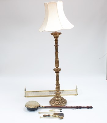 Lot 205 - A giltwood standard lamp of altar candlestick...