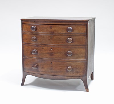 Lot 206 - A Victorian bowfront chest three long drawers...