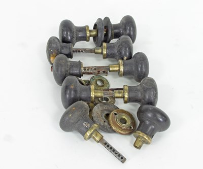 Lot 261 - Five Edwardian turned wood door knobs, bars...