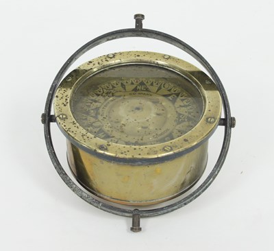 Lot 270 - A ship's brass compass by C Butterfield and...