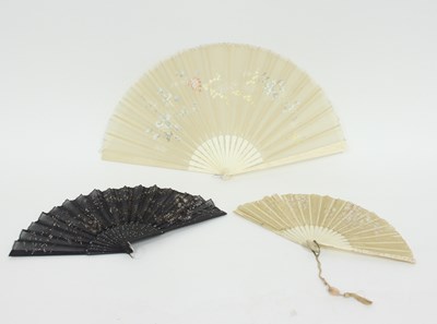 Lot 296 - Three carved bone fans, the largest example...