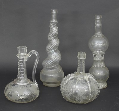 Lot 307 - A Dutch engraved glass onion shaped bottle, an...