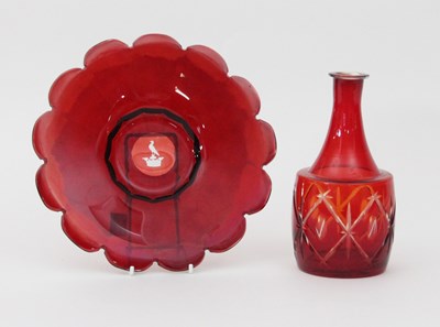 Lot 314 - A ruby glass crested plate, 23cm diameter and...