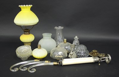 Lot 321 - A Victorian glass oil lamp with ribbed yellow...