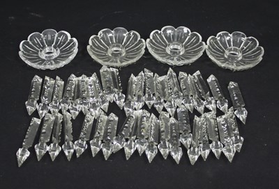 Lot 322 - Four cut glass nozzles, each suspending ten...