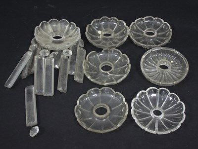 Lot 323 - Seven cut glass nozzles, four suspending...