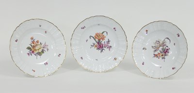 Lot 341 - A set of three KPM porcelain plates painted...