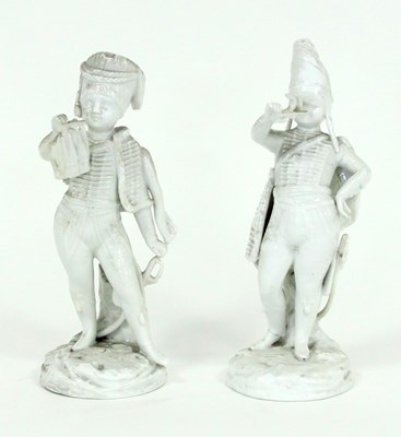 Lot 345 - A pair of German white porcelain figures of...