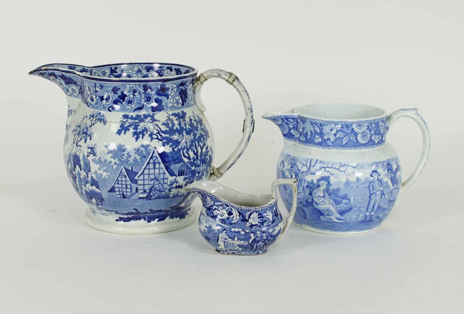 Lot 374 - A large blue and white punch jug, 19cm high,...