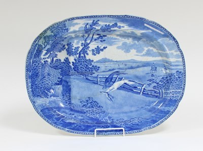 Lot 377 - A Toft & May blue and white well dish, hare...