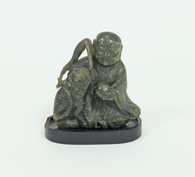 Lot 416 - A Chinese soapstone carving of Buddha and a...