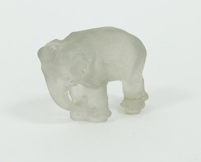 Lot 422 - A glass elephant, indistinctly signed, 10cm high