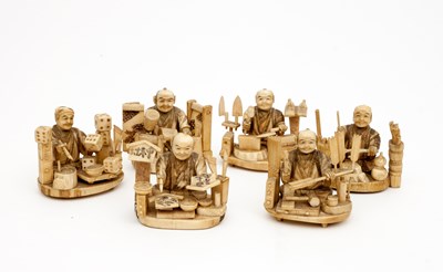 Lot 426 - A collection of six Japanese ivory okimono of...