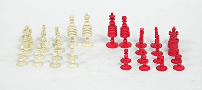 Lot 431 - A Chinese red stained and white ivory chess...