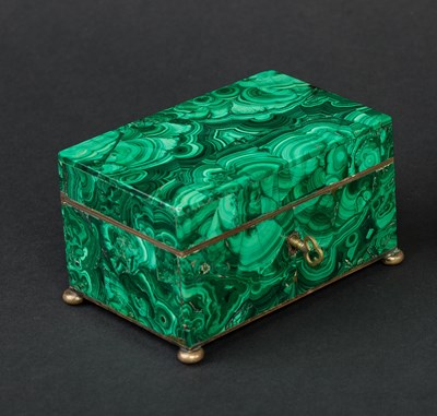 Lot 450 - A Russian malachite box with key on ball feet,...