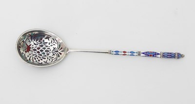 Lot 473 - A Russian silver and enamelled spoon, Pavel...