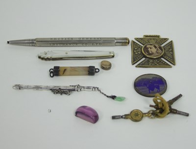 Lot 533 - A miniature white metal sword and scabbard, a...