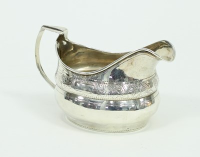 Lot 538 - An Irish silver cream jug, Dublin 1806, of...