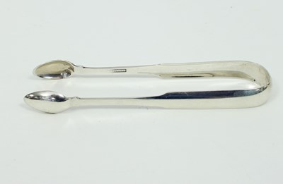 Lot 549 - A pair of Irish provincial silver sugar tongs,...