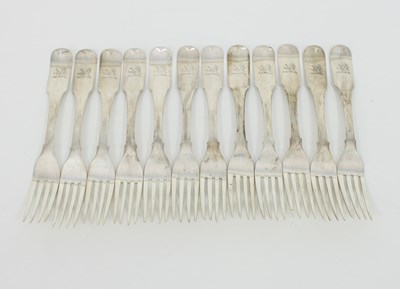 Lot 551 - A set of twelve Irish silver table forks, John...