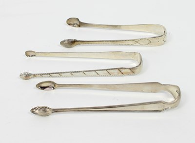 Lot 554 - A pair of Irish silver sugar tongs, W L,...