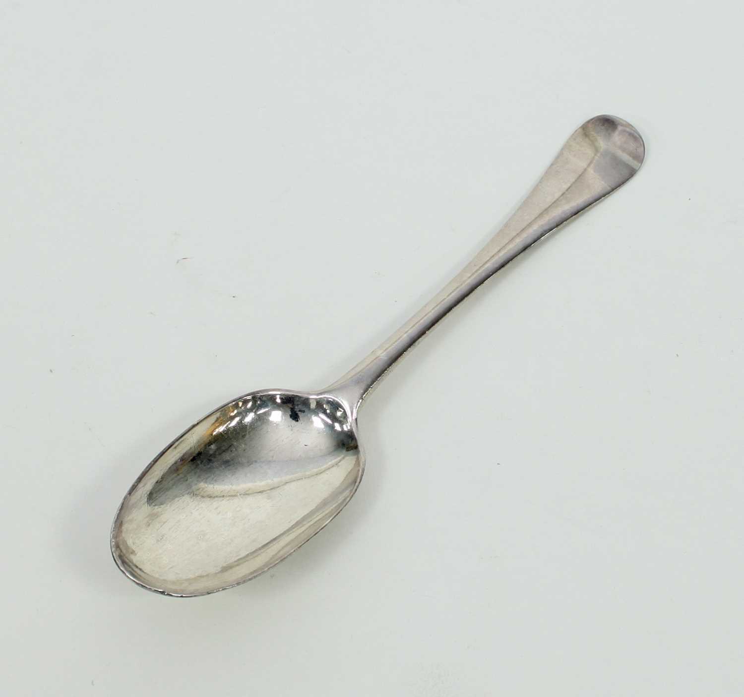 Lot 557 - An 18th Century silver rat tail spoon,...