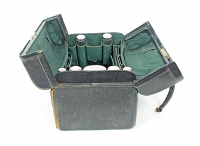 Lot 574 - A doctor's green leather travelling case...