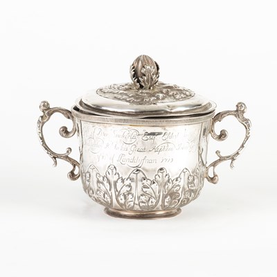 Lot 577 - A late 17th Century silver porringer and cover,...