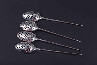 Lot 597 - Four early 18th Century silver mote spoons,...