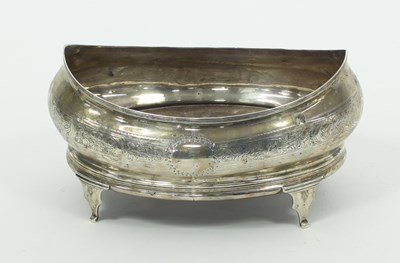 Lot 610 - A silver oval boat shaped base of a George III...