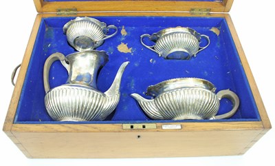 Lot 617 - A four-piece silver tea service, Walter & John...