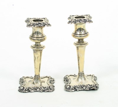 Lot 618 - A pair of silver candlesticks, Birmingham 1907,...