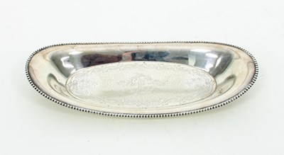 Lot 620 - A silver oval dish, marked sterling, with...