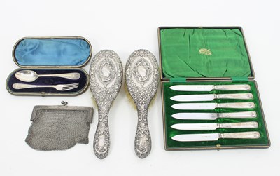 Lot 623 - A pair of silver backed hair brushes,...