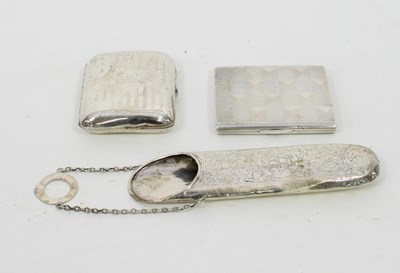 Lot 647 - An Art Deco silver cigarette case, A E Poston...