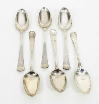 Lot 654 - Five George III silver table spoons, maker's...