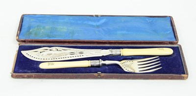 Lot 674 - A pair of fish servers with crested ivory...