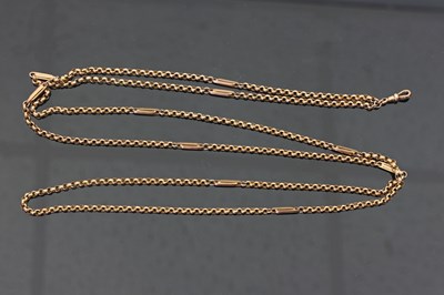 Lot 687 - A 9ct gold guard chain, the faceted links...