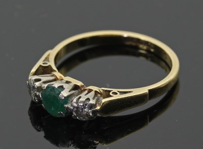 Lot 689 - An emerald and diamond 18ct gold ring