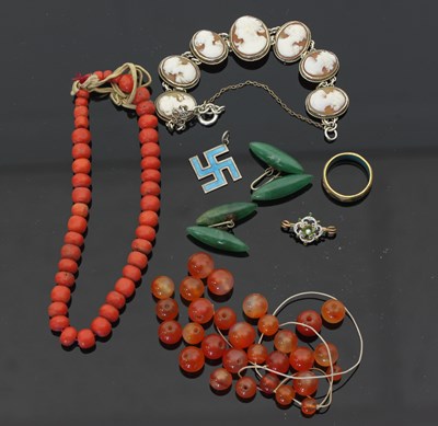 Lot 691 - A single strand of graduated coral beads, a...